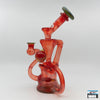 Artisan Quality Glass Rig: Curse Glass, Full-Color Recycler (Exp Red), Bold Design, Striking Red Finish, Expert Craftsmanship, Superior Functionality, Smooth Filtered Hits, Compact and Durable, Perfectly Sized, Portability, Performance and Aesthetics.