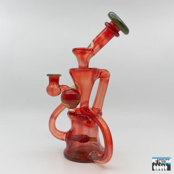 Artisan Quality Glass Rig: Curse Glass, Full-Color Recycler (Exp Red), Bold Design, Striking Red Finish, Expert Craftsmanship, Superior Functionality, Smooth Filtered Hits, Compact and Durable, Perfectly Sized, Portability, Performance and Aesthetics.