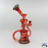 Compact Durable Glass Rig: Curse Glass, Full-Color Recycler (Exp Red), Bold Design, Striking Red Finish, Expert Craftsmanship, Superior Functionality, Smooth Filtered Hits, Perfectly Sized, Portability, Artisan Quality, High-End Glass Rig, Performance and Aesthetics.