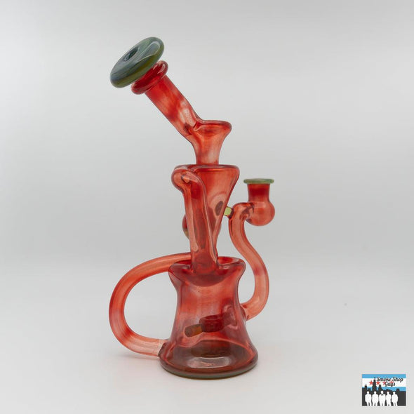 Compact Durable Glass Rig: Curse Glass, Full-Color Recycler (Exp Red), Bold Design, Striking Red Finish, Expert Craftsmanship, Superior Functionality, Smooth Filtered Hits, Perfectly Sized, Portability, Artisan Quality, High-End Glass Rig, Performance and Aesthetics.