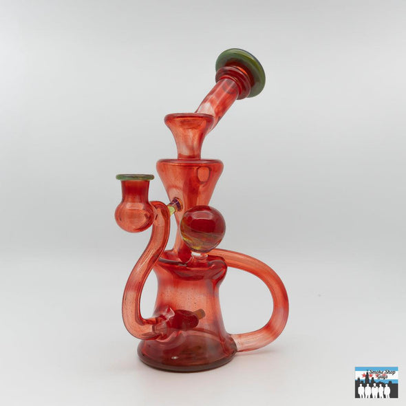 Enhanced Filtration Recycler Rig: Curse Glass, Full-Color Design (Exp Red), Bold Design, Expert Craftsmanship, Superior Functionality, Smooth Filtered Hits, Compact and Durable, Perfectly Sized, Portability, Artisan Quality, High-End Glass Rig, Performance and Aesthetics.