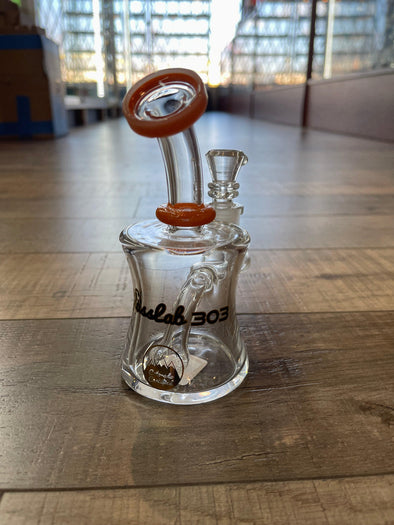 Glasslab303 Mini Oil Can Rig – Compact and Vibrant Glass Dab Rig in Assorted Colors: Combines Portability with High-Quality Craftsmanship, Perfect Choice for Concentrate Enthusiasts, Available in Assorted Vibrant Colors, Compact Rig, Both Functional and Stylish, Ideal for On-the-Go Sessions or Home Use, Designed with Precision, Ensures Smooth Vapor Flow, Easy Handling, Seamless Dabbing Experience.