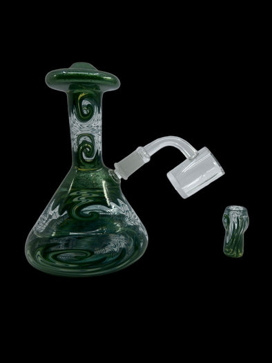 Hedman Headies Wigwag Mini Beaker Bong featuring vibrant artistic wigwag detailing, crafted from premium heat-resistant glass for smooth hits.







