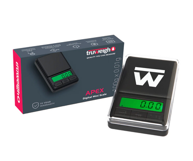 Truweigh Apex Digital Mini Scale with 1000g capacity and 0.1g readability, featuring a compact design, backlit LCD, tare function, and protective cover for precision weighing.